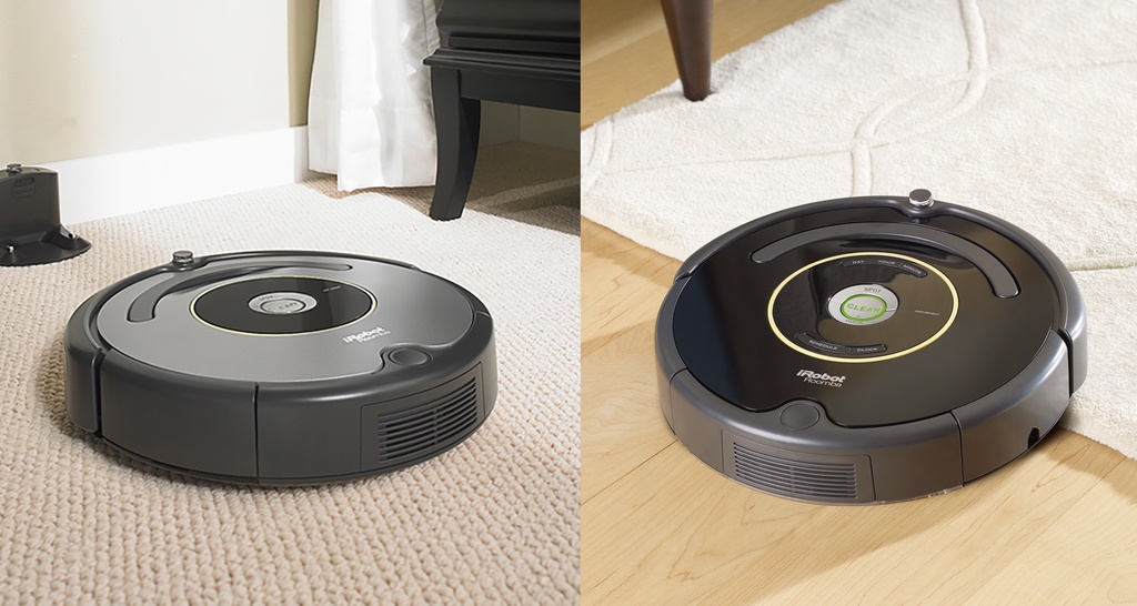 Picture of a grey Roomba pitted against a black Roomba