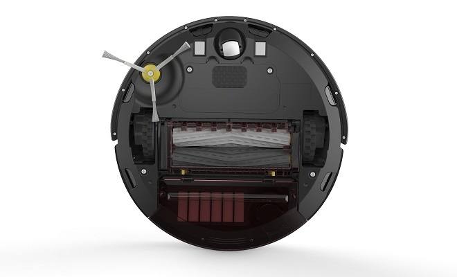The underside of a Roomba vacuum shows its two brushless extractors.